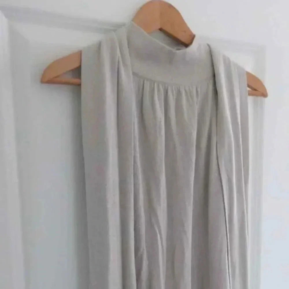 Axara Paris  knitted grey turtleneck midi Dress